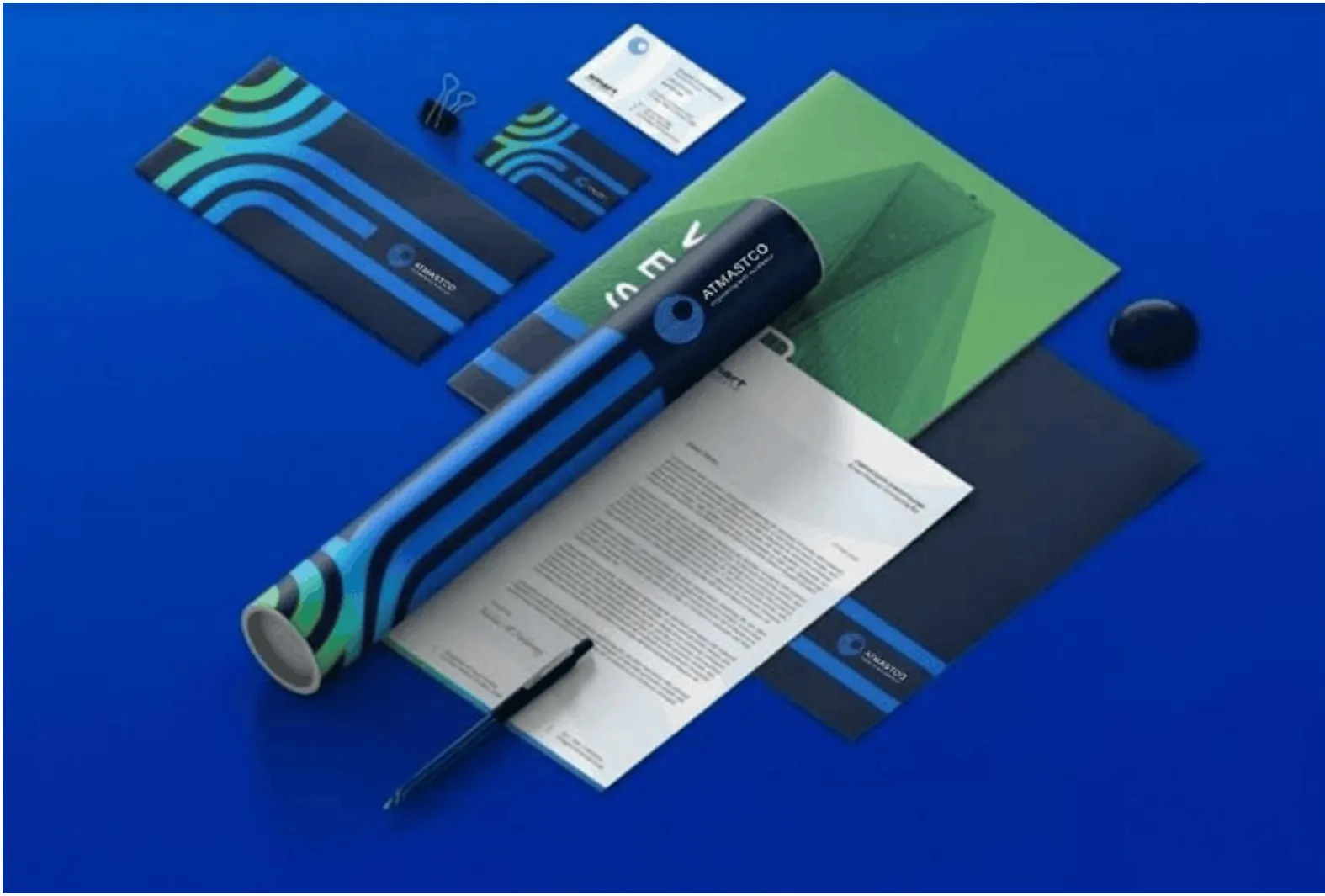 Corporate stationery: letterhead, envelopes, business cards and a poster tube