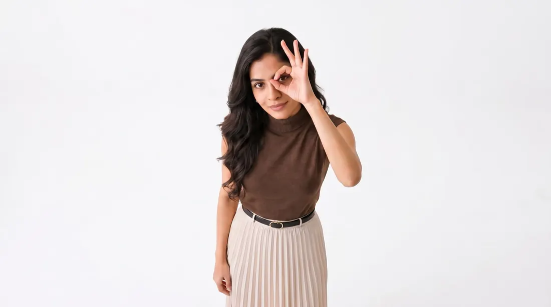 The presenter standing with an OK sign
