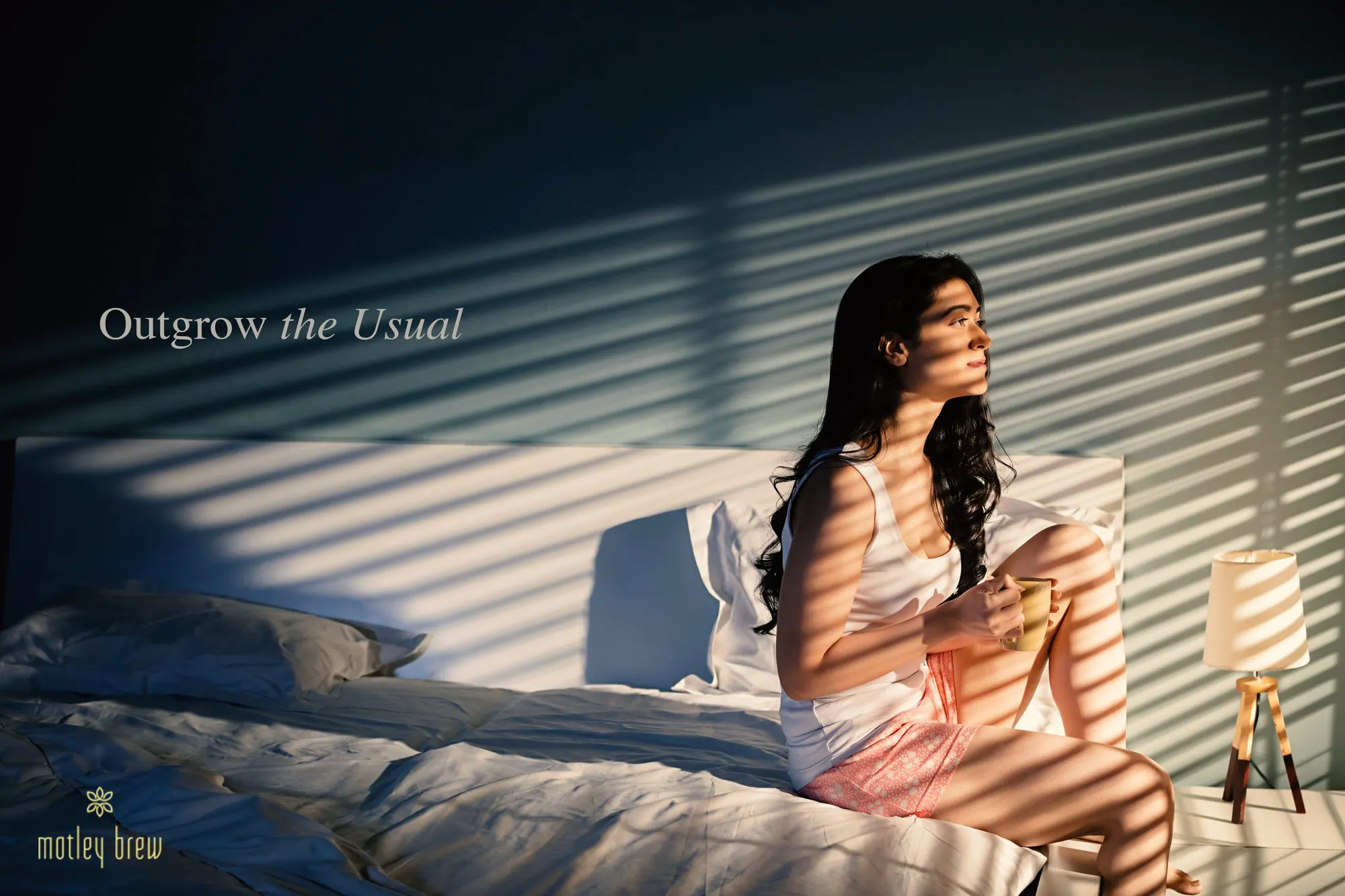 Outgrow the Usual: a woman with a cup of coffee in morning light